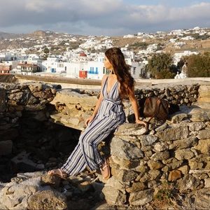 Lulu’s NAVY BLUE AND WHITE STRIPED HALTER JUMPSUIT